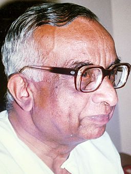 Side profile of K.N.Raj in his later years. He looks towards the right, passive expression on his face.